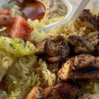 Chicken Kabob · Charbroiled cubes of boneless chicken, marinated in special sauce and spices. Served with hu...