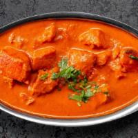 Chicken Makhani (Ala Carte) · Chicken baked in clay oven cooked in mild cream sauce.