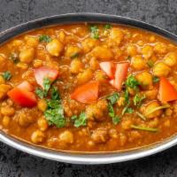 Chana Masala (Ala Carte) · Garbanzo beans cooked with onions, tomatoes and spices.