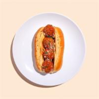 Meatball Parmesan Sandwich · Three meatballs covered in Ma's Sunday Sauce and melted mozzarella on a toasted Italian roll.