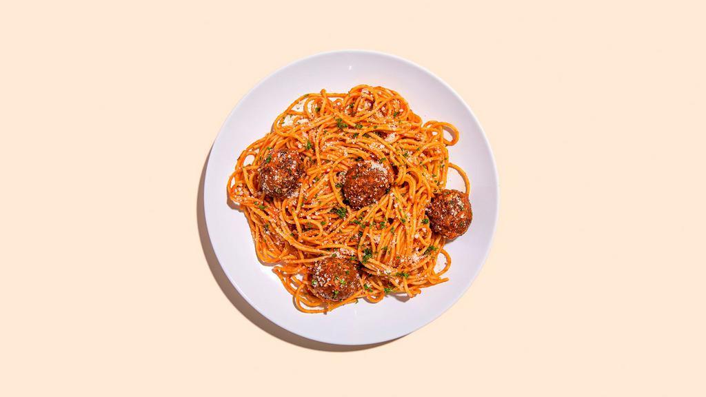 Spaghetti And Meatballs · Four meatballs over spaghetti with Ma's Sunday Sauce and fresh Parm.