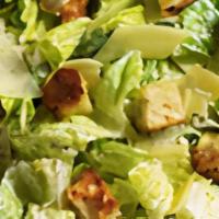 Caesar Salad · Romaine with crunchy croutons, fresh Parm, and creamy Caesar dressing.