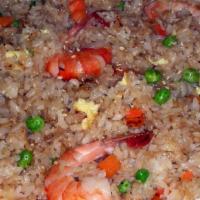 Shrimp Fried Rice · Pan-fried rice with carrots, peas, egg and shrimp mixed.