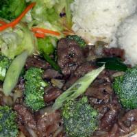 Broccoli Beef · Thin beef sautéed yellow onion and broccoli mixed mild sauce.