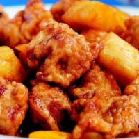 Sweet & Sour Pork · Bite-size chicken pieces deep-fried and mixed sweet and sour sauce.