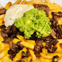 Carne Asada Fries · Crema, pico de gallo, queso y aguacate. Sour cream, pico de gallo, cheese and avocado.