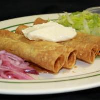 Rolled Tacos · Pollo (chicken).