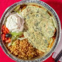 Spinach Enchilada Dinner · Two corn tortillas stuffed with spinach blend, covered with our delicate tomato sauce & topp...