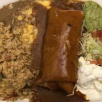Red Chili Chimichanga · Served with sauce, rice, beans and sour cream.
