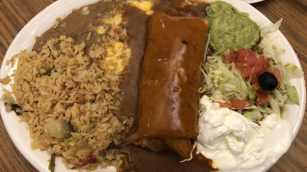 Red Chili Chimichanga · Served with sauce, rice, beans and sour cream.