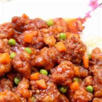 General Tao'S Chicken · Fried chicken sautéed in a sweet and spicy sauce w/peas and carrots.