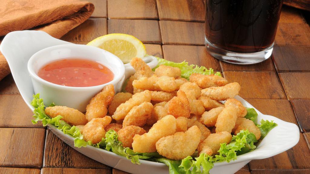 Popcorn Shrimp · Fresh shrimp, battered and fried to perfection.