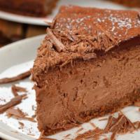 Chocolate Cheesecake · Classic cheesecake with a rich, dense, smooth, and creamy consistency filled with chocolate.