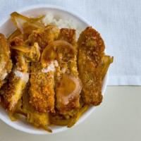 Katsu Don · Deep fried breaded pork and onion cooked with beaten egg.