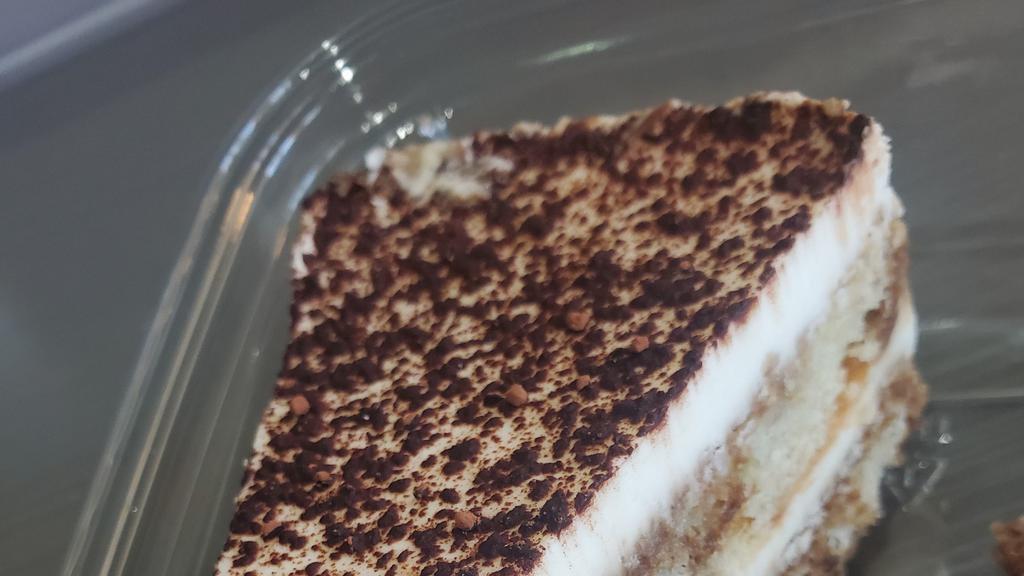 Tiramisu · Traditional Italian  dessert,  coffee liquor, mascarpone cheese and sponge cake.