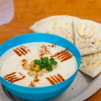 Hummus Plate · A smooth mix of mashed garbanzo beans, tahini, lemon, garlic, and olive oil. Served with pit...