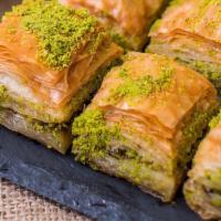 Pistachio Baklava · Our homemade Baklava filled with extra pistachio, moistened with a light sugar syrup.