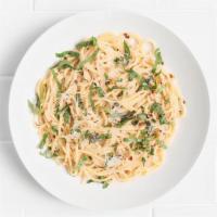 Spaghetti Aglio E Olio · A simple classic with sautéed garlic, olive oil, fresh basil, chili flakes, parmesan.
