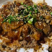 Sukiyaki Rice Bowl · Thin Sliced fatty beef, onion, simmered in Dashi Shoyu broth,green onion, and sesame seeds