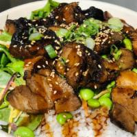 Pork Belly Rice Bowl · Marinated Grill Pork Belly served over the rice And salad mix , carrots, edamame, with teriy...