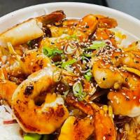 Shrimp Teriyaki · Grill Shrimp over the rice and salad mix, carrots, edamame, teriyaki sauce, green onion, ses...