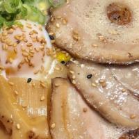 Tonkotsu Ramen · Pork and chicken broth, Chasu Pork, soy sauce base, poached egg, corn, bamboo shoots, scalli...