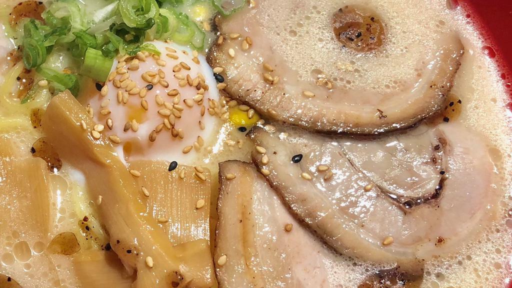 Tonkotsu Ramen · Pork and chicken broth, Chasu Pork, soy sauce base, poached egg, corn, bamboo shoots, scallion.