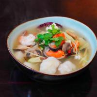 Seafood Soup · Mix seafood in spicy lemongrass soup with Thai herbs.