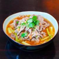 Noodle Soup (Beef / Chicken) · Noodle soup with chicken or beef and meat balls.
