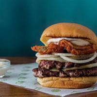 The Slapshot · Double provolone cheeseburger topped with crispy pickles, onion and garlic mayo (contains mi...