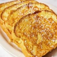 French Toast (4) · French toast with butter and syrup.