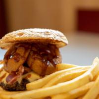 Cowboy Burger · Pepper jack cheese, onion rings, bacon, BBQ sauce.