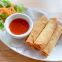 Thai Spring Rolls (4) · Deep fried spring roll stuffed with vegetables served with sweet and sour sauce.