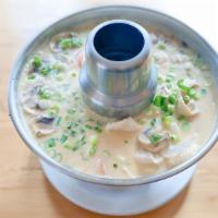 Chicken Tom Kha · Hot and sour coconut milk soup with lemongrass, galanga roots, kaffir leaves mushrooms and t...