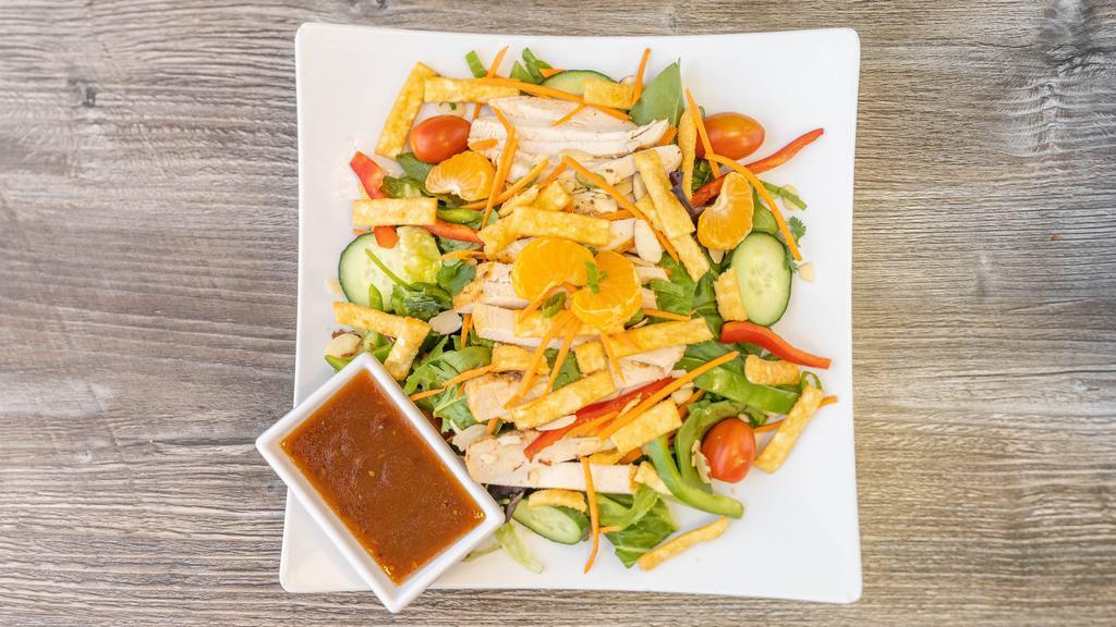 Crunchy Thai Chicken · Mixed greens, turkey, ham, cucumber, tomato, carrots, jack and cheddar, house croutons and house ranch dressing.