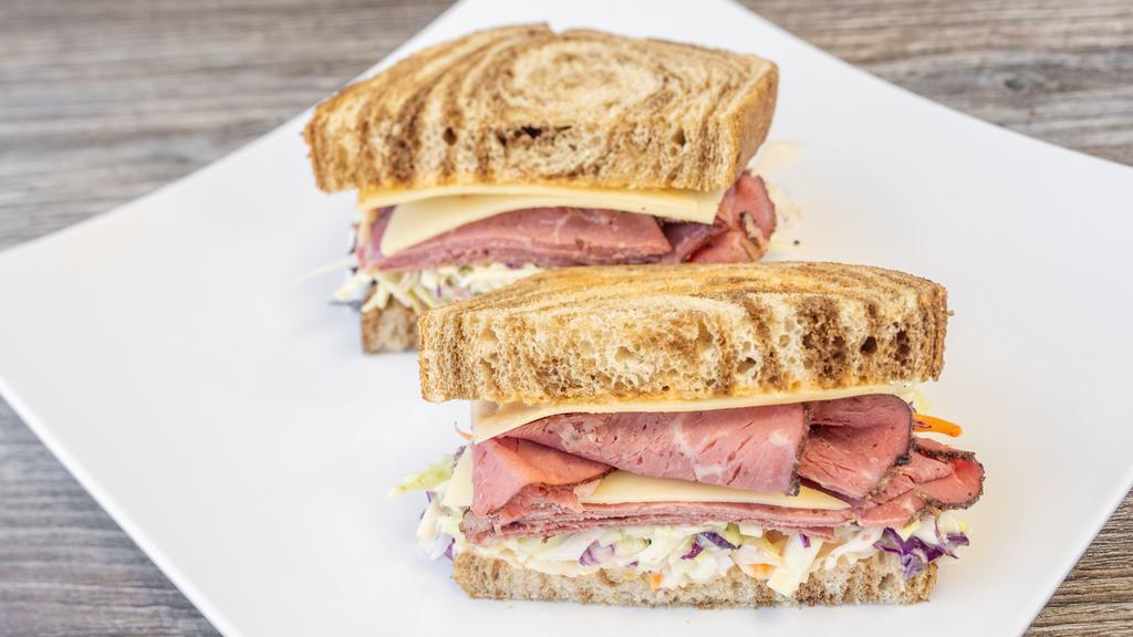 Y. Favorites · Choice of turkey, pastrami or corned beef, swiss cheese, house slaw and thousand island dressing on toasted marble rye with pickle spear.