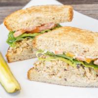 Walnut Chicken · House chicken salad, lettuce, tomato and mayo, on multigrain or wheat wrap, with pickle spear.