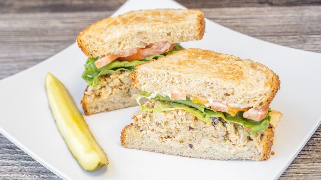 Walnut Chicken · House chicken salad, lettuce, tomato and mayo, on multigrain or wheat wrap, with pickle spear.