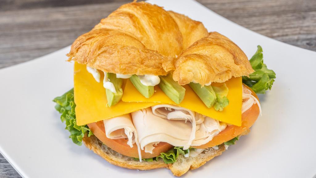 Cali Croissant · Grilled chicken or oven-toasted turkey, choice of cheese, lettuce, tomato, red onion and mayo.