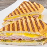 Cubano · Pickles and mustard on a French bread.