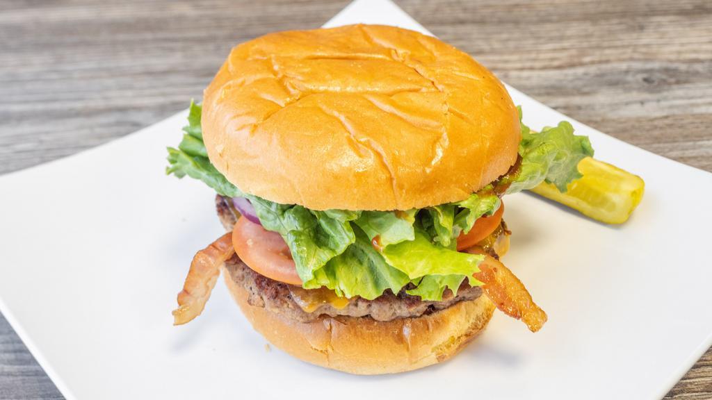 Bbq Bacon & Cheddar · 1/3 lb. angus, bacon, cheddar, lettuce, tomato, red onion, sweet baby ray's sauce and pickle spear.