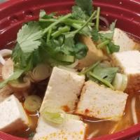 Tom Yum · Hot and sour soup with galanga, lemongrass, lime juice, mushroom and cilantro.