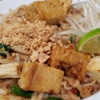 Pad Thai · Ground peanuts, egg, green onion, bean sprouts and tamarind sauce. Served with rice noodles.