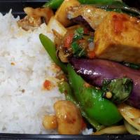 Angle Eggplant · Eggplants with bell peppers, sliced green onions, sweet basil, chili paste & yellow curry po...