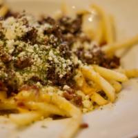 Loaded Street Fries · Our street fries topped with shredded cheese, Gol cheese sauce, ground top sirloin and  cris...