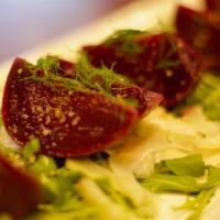Gol Beet Salad · Fresh mixed greens, roasted beets with a house-made sweet bourbon sauce topped with candy al...