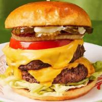 Double House Burger · Our special house cheeseburger with two patties, lettuce, tomato, onions, and house sauce.