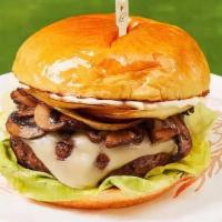Mushroom Swiss Burger · A juicy burger with swiss cheese, mushrooms, onions, lettuce, and house sauce.