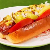 Chicago Style Hot Dog · Hot dog with yellow mustard, chopped white onions, sweet relish, a dill pickle spear, and to...