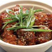 Crispy Spicy Chicken Snack · Marinated sliced chicken tenders.
Korean season fried spicy chicken with tater tots. (Yangny...